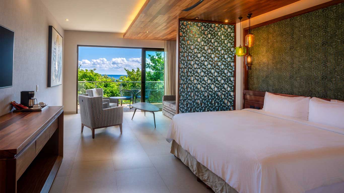 Sandos Playacar resort pool and gardens